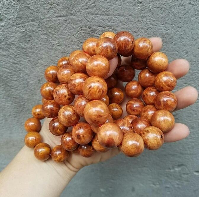 VÒNG TAY GỖ NU HUYẾT LONG 18LY