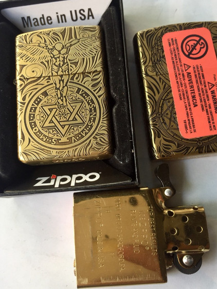 Bật lửa zippo thiên thần- khắc 5 mặt - ruột vàng - có tem đỏ