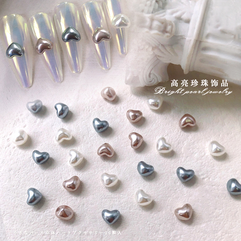 Charm trái tim ngọc trai nổi trang trí móng (hũ)