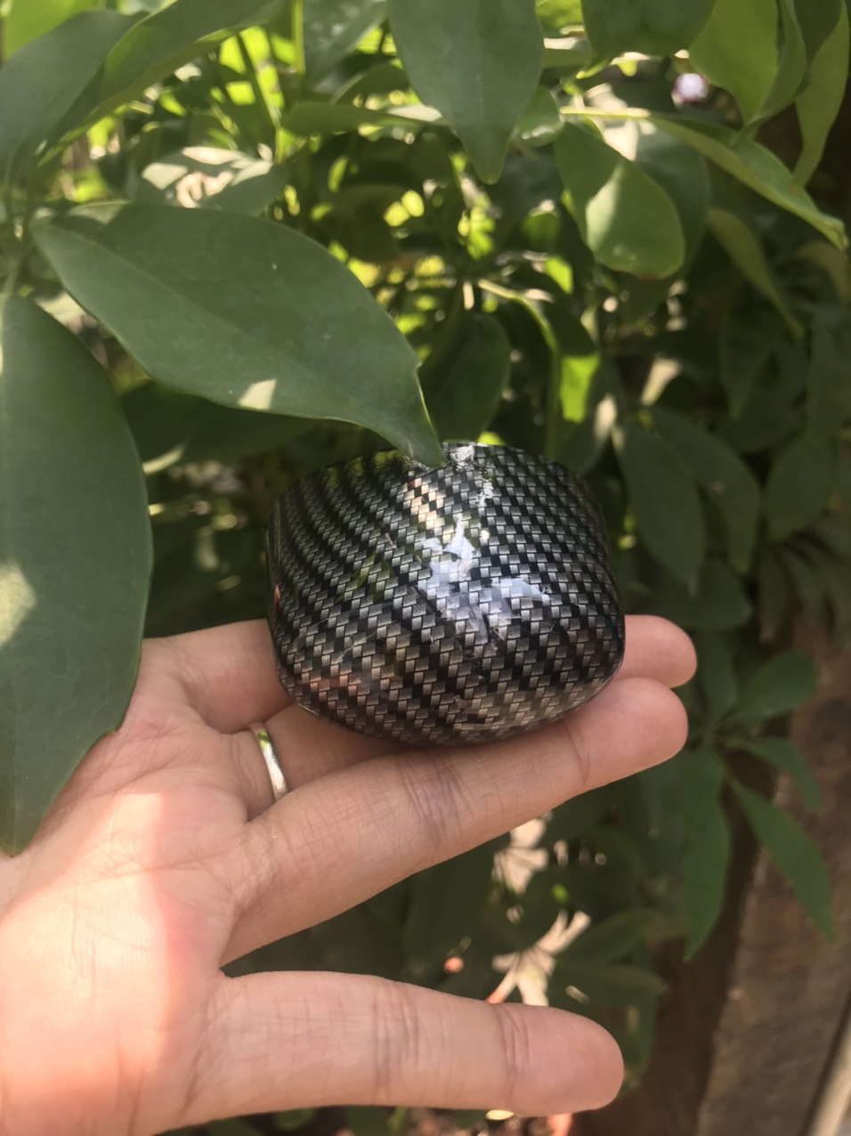 Ốp /chụp đèn soi biển số xe Exciter 150 màu Cacbon.