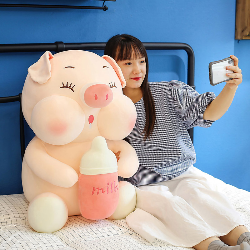 Thú bông heo ôm bình sữa size lớn vải miniso 4 chiều cao cấp giá rẻ