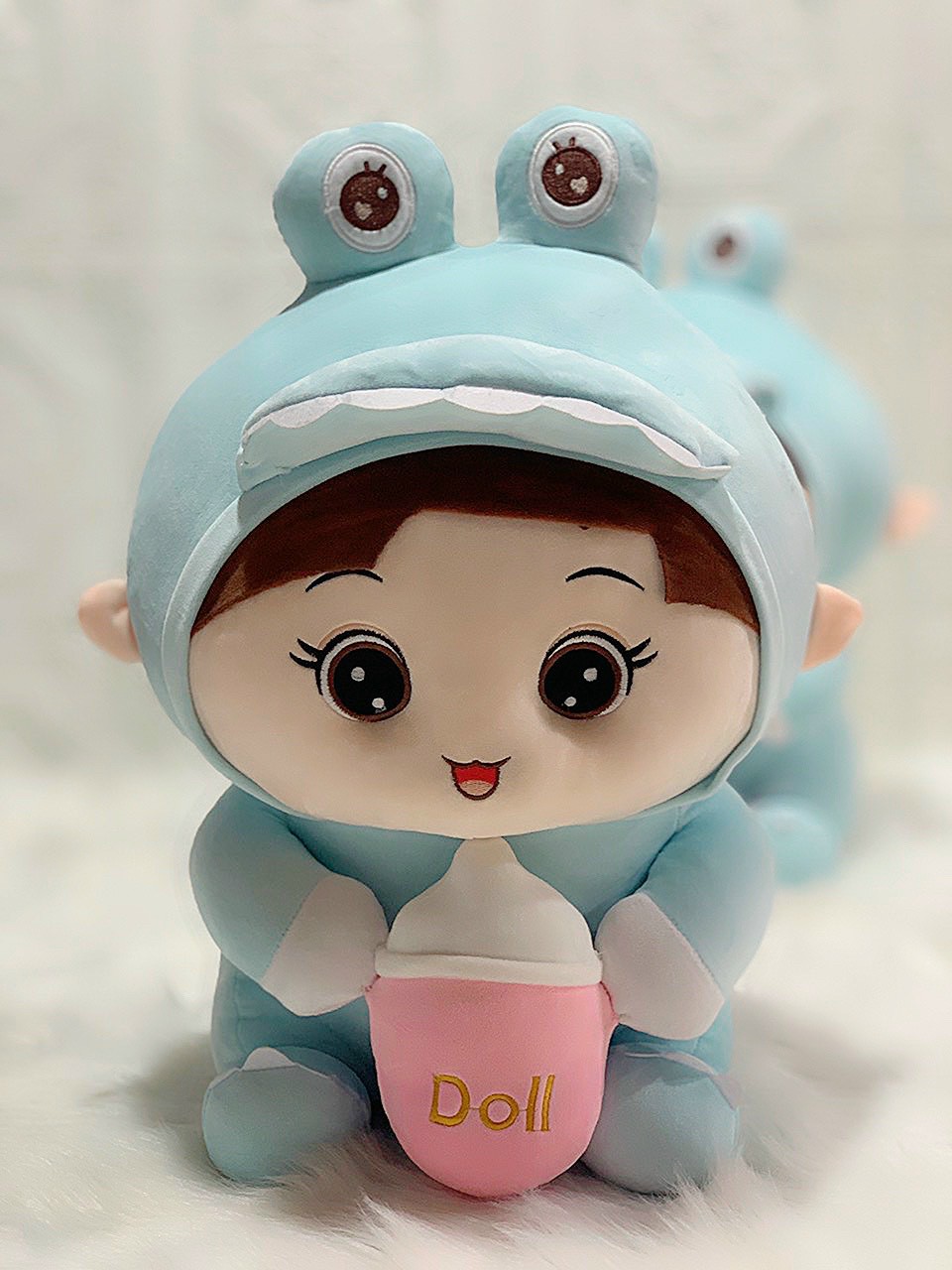 Doll (coslay dinosaur) hugging milk tank