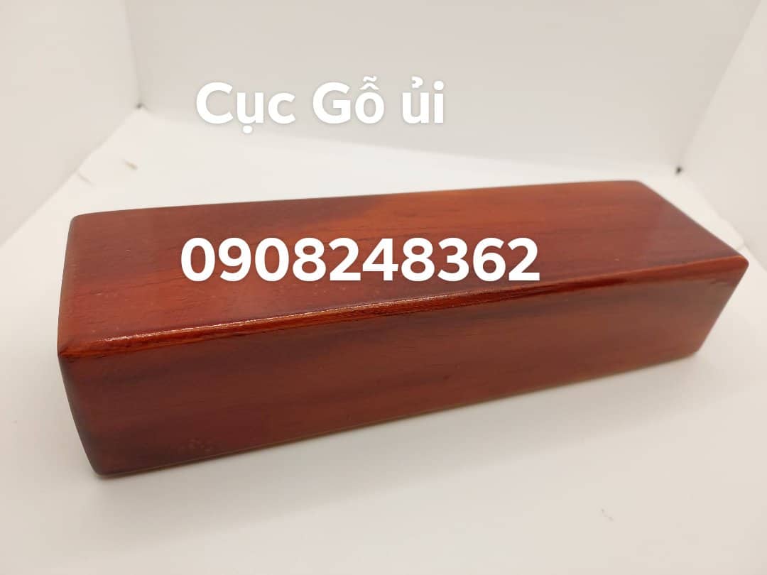 Cục gỗ ủi quần ao