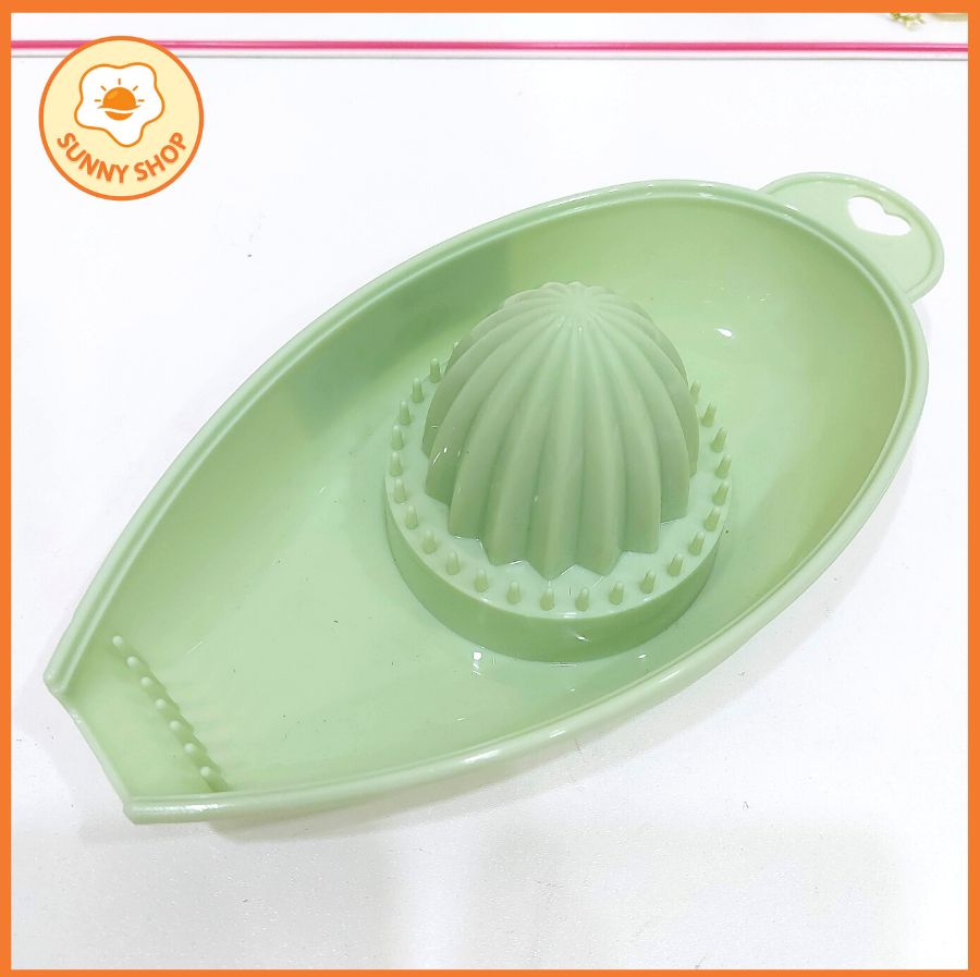 Dụng cụ vắt cam nhựa