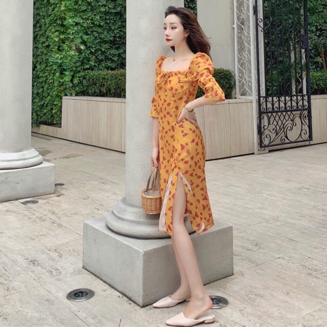 Đầm hoa vàng xẻ tà form dài