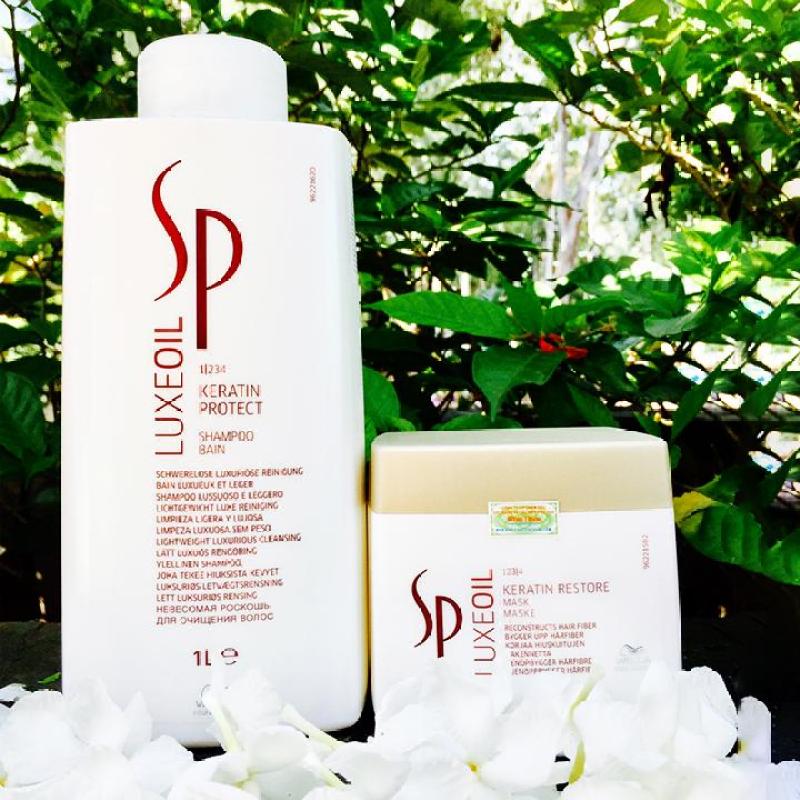 Cặp gội hấp cao cấp SP LUXEOIL 1000ml bảo vệ và tái tạo cấu trúc tóc.