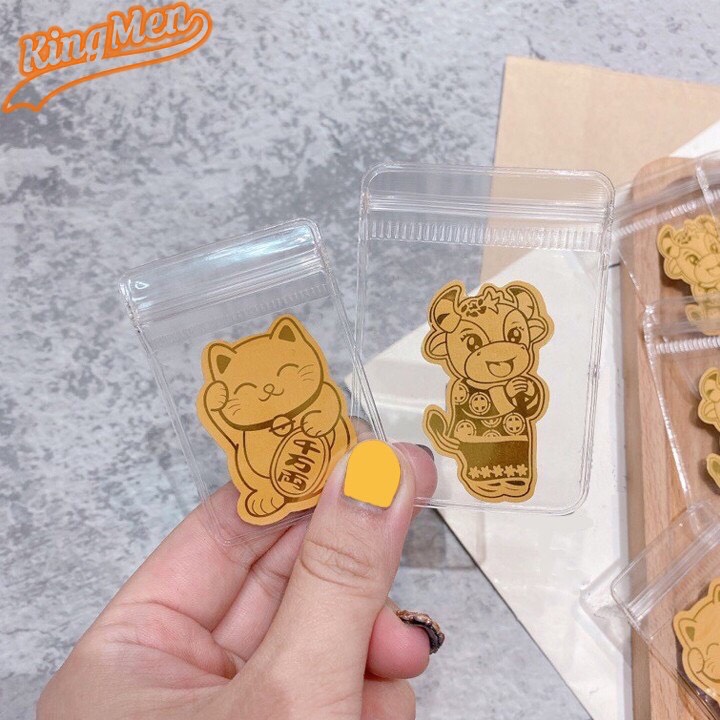 Mèo thần tài, trâu vàng mạ vàng 24k dán điện thoại may mắn chiêu tài lộc