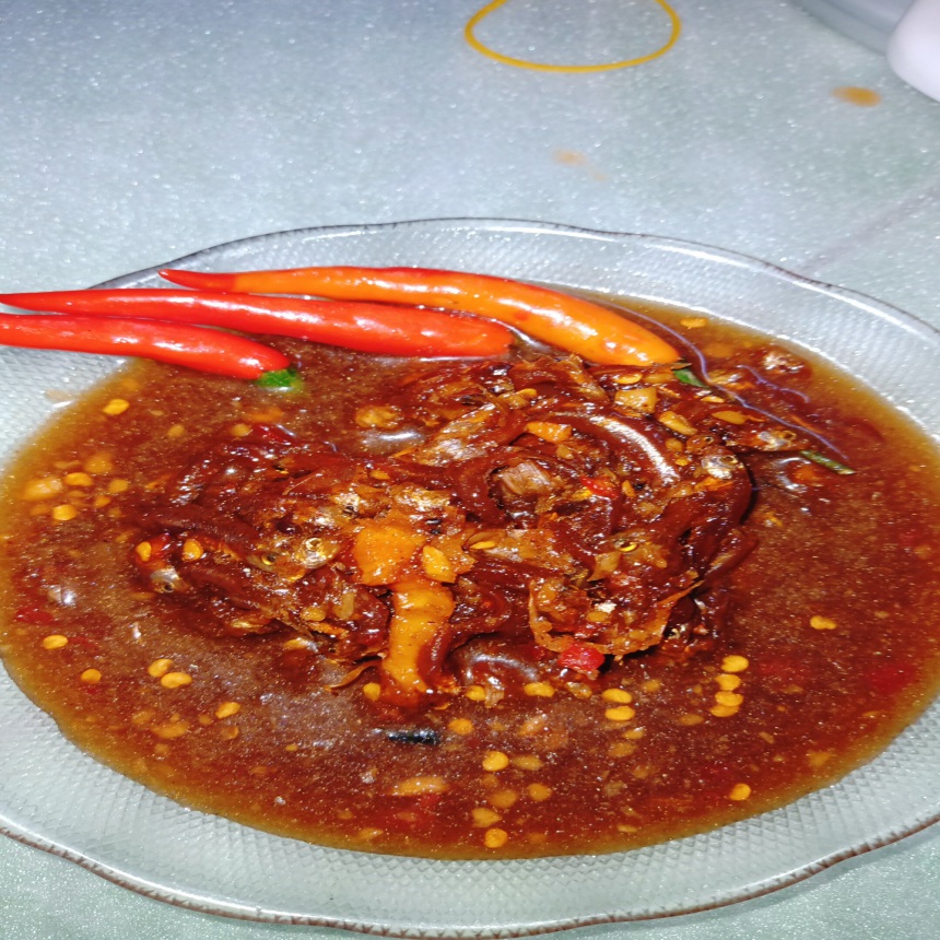 Mắm chua đặc sản Tây Ninh (mắm cá cơm) vị mắm chua ngọt vừa ăn, không mặn, ăn trực tiếp với cơm trắng hoặc rau sống đều được, có thể kho với thịt hay làm mắm chưng đều ngon, Khô Ông Chín