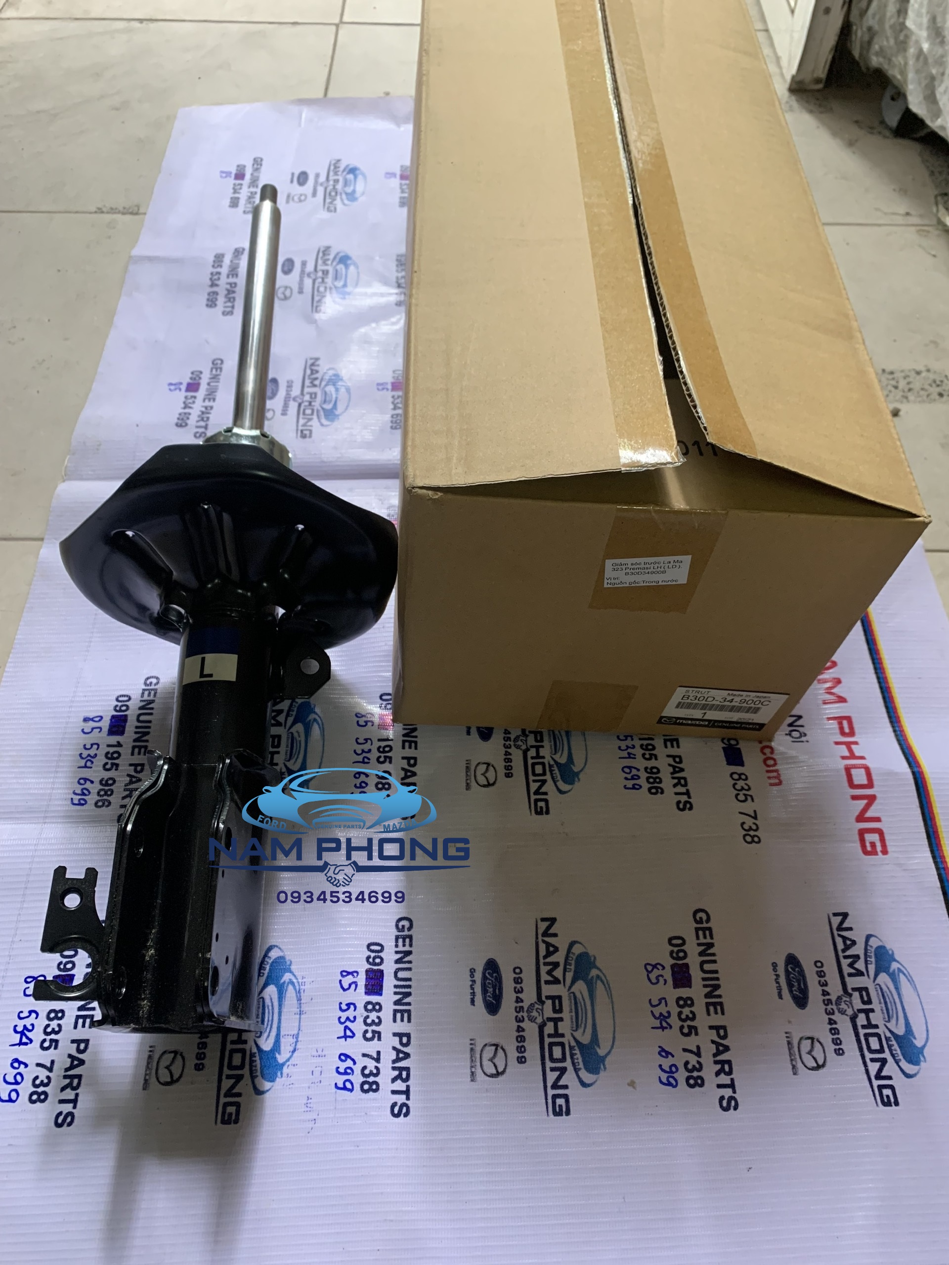 Giảm sóc sau Laser Mazda 323 bên lái LH - BVJE28900 / BL5P28900 / BK2J28900E / BK2J28900G