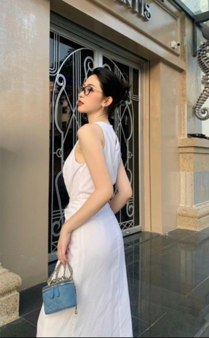 Đầm sát nách dáng dài tà đắp buộc nơ eo