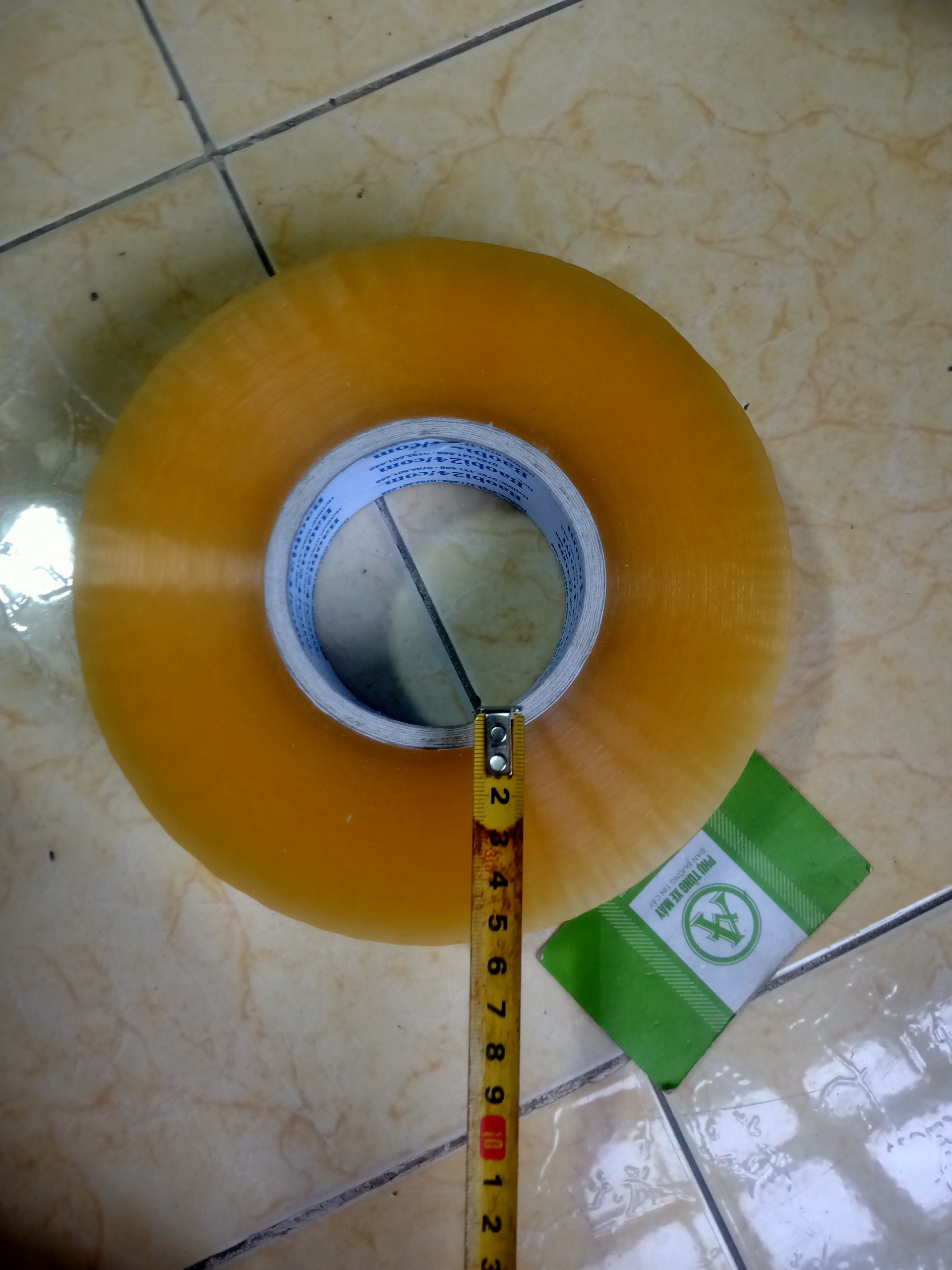 Bán băng dính cuộn to 1kg lõi mỏng