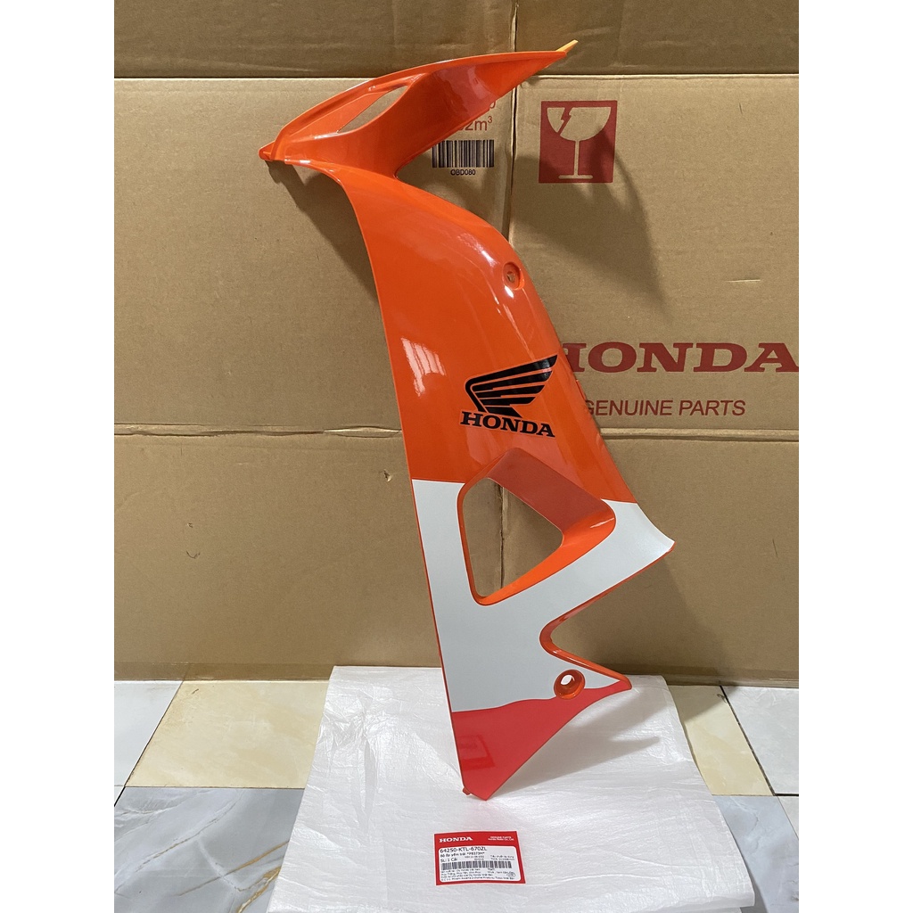 Ốp yếm bên trái honda wave rs100 repsol năm 2006 màu cam.