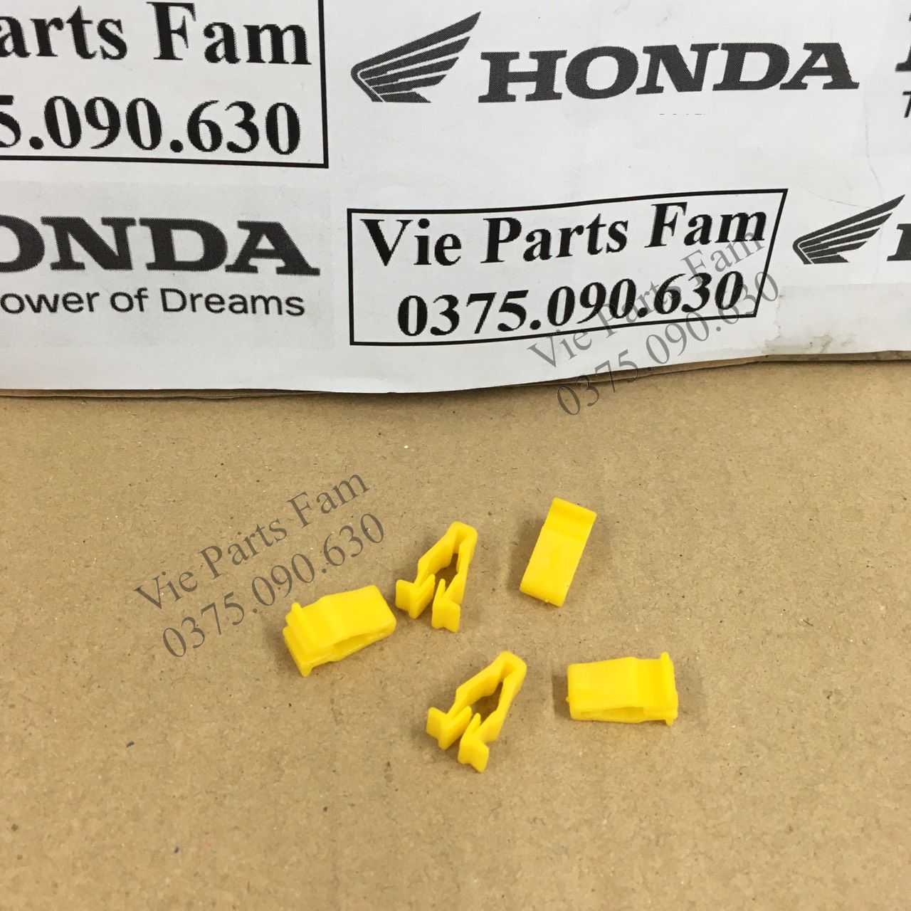 Kẹp vàng dàn áo honda