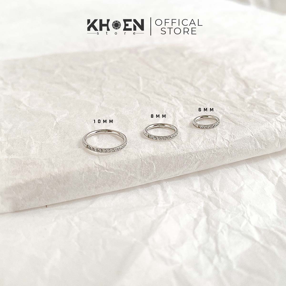 Khuyên tròn nút bật đá nằm dưới - titan g23 - khoen store