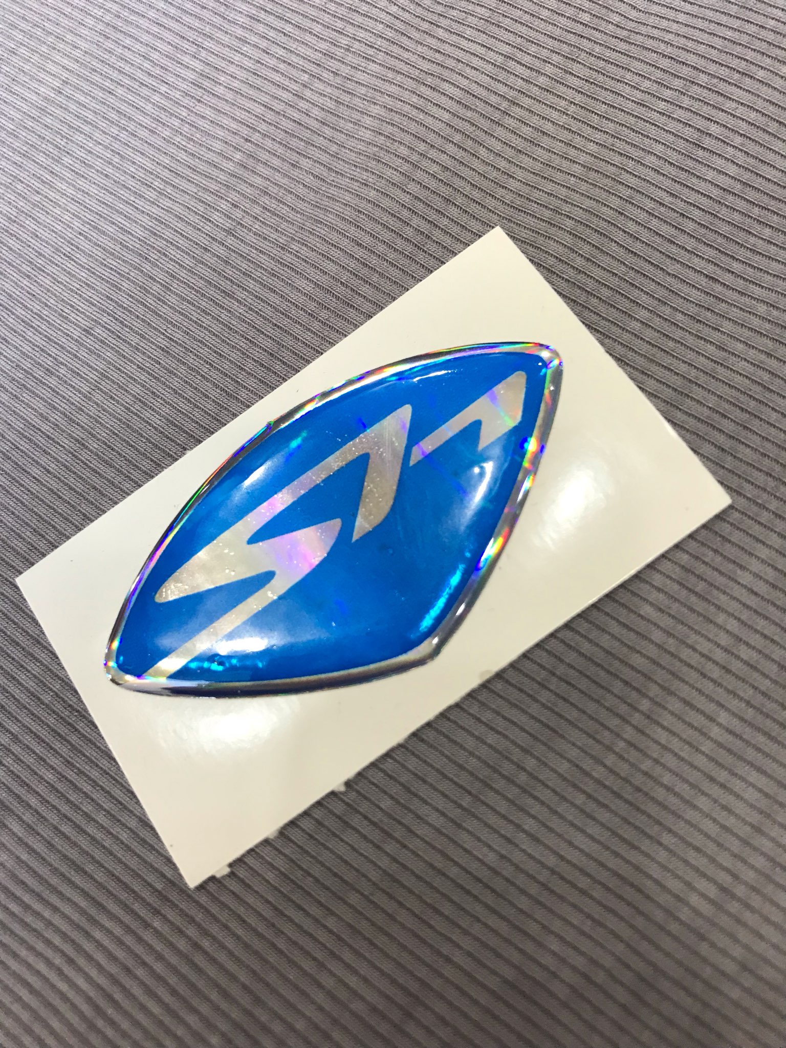 Tem logo SH sắc nét màu xanh