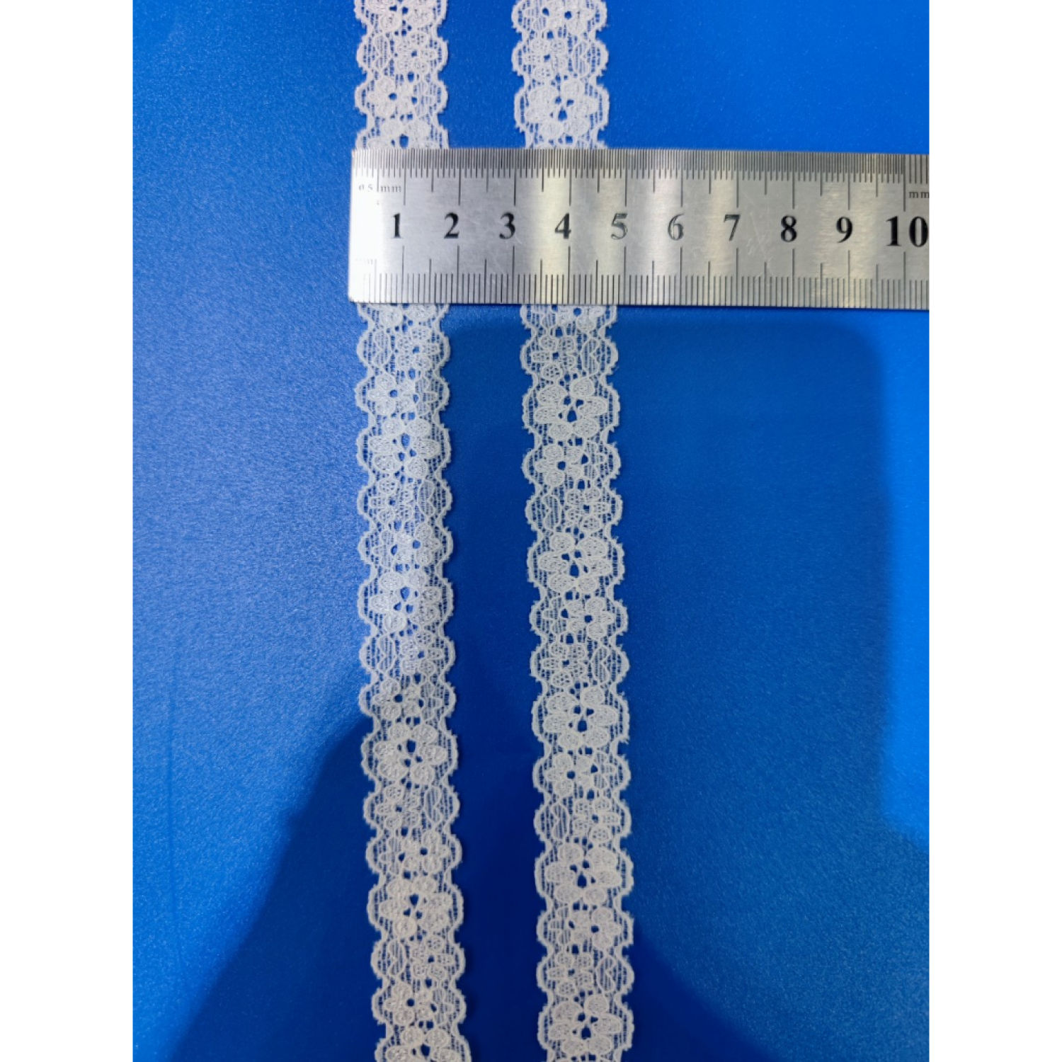 [0033] - 1m viền ren hoa 5+6 cánh co giãn