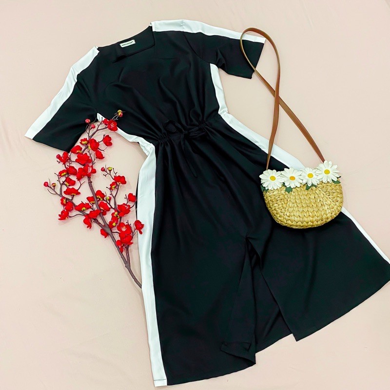 Đầm đen phối trắng rút eo