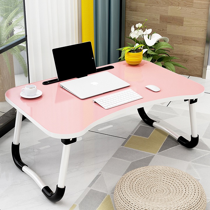 Folding study table compact has slot for iPad