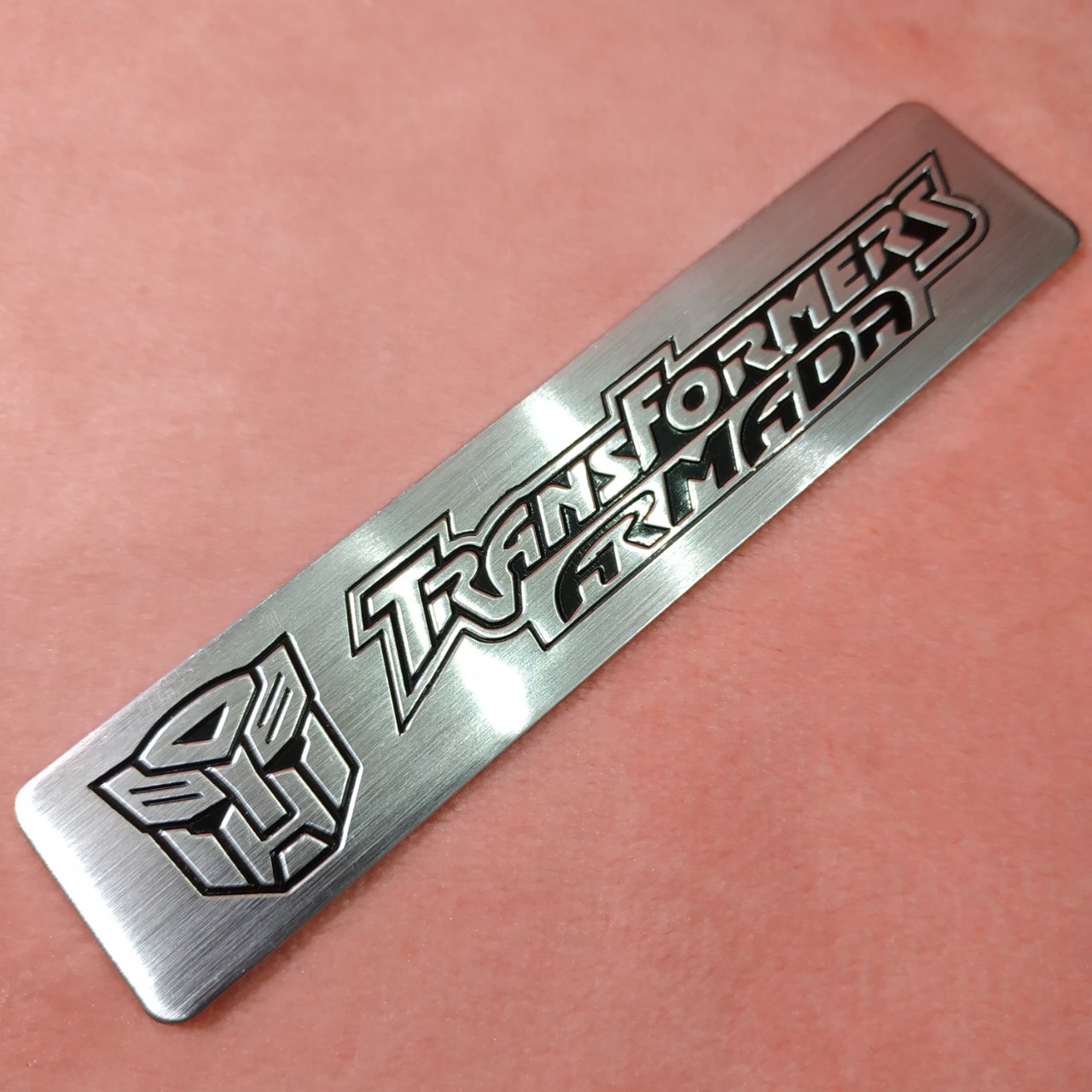 Tem nhôm dán xe TransFormer trắng dài 12x2.6cm