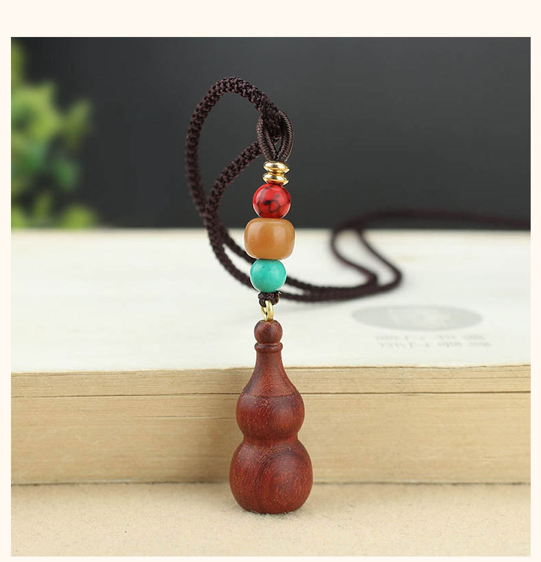 Mặt đeo chú lăng nghiêm hình hồ lô