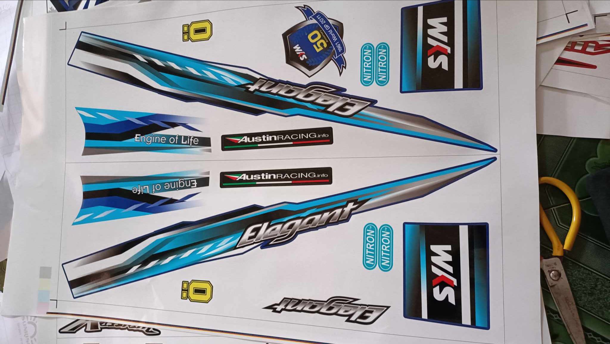Tem rời elegant 50cc xi nhan dưới dán xe xanh bụng trắng