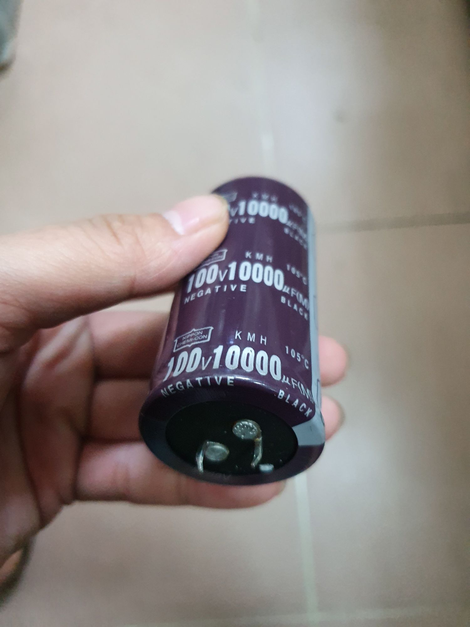 tụ âm ly 10000mi 100 vôn