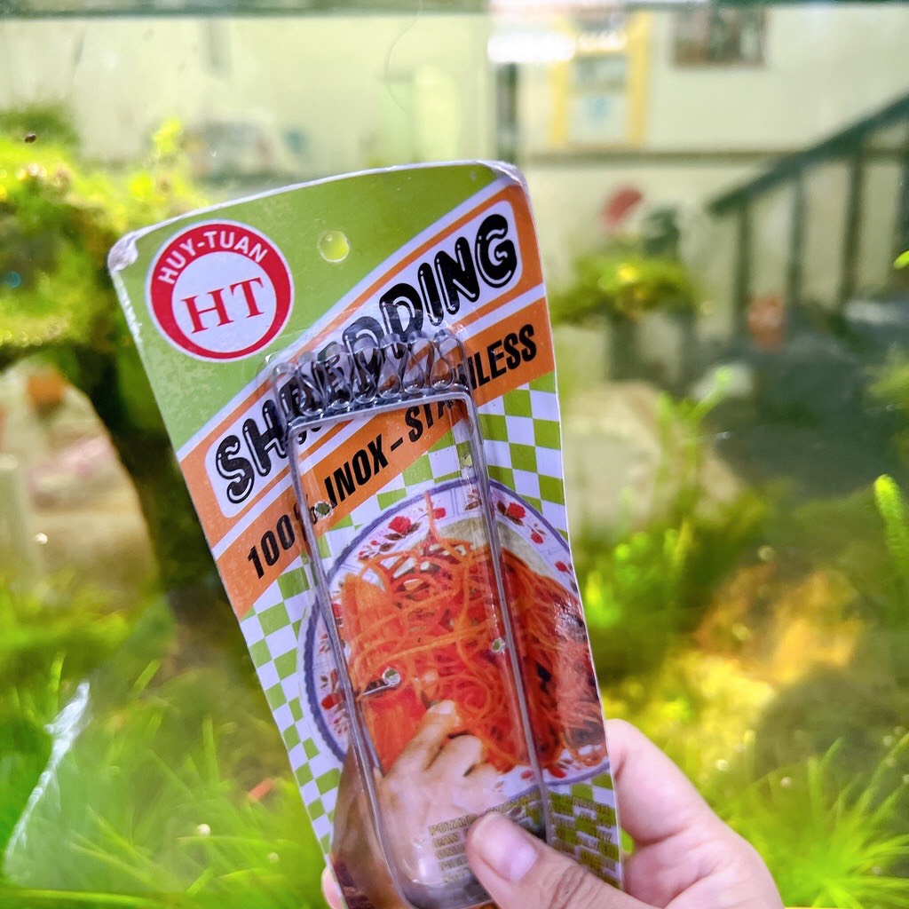 Dụng cụ bào đu đủ thành sợi