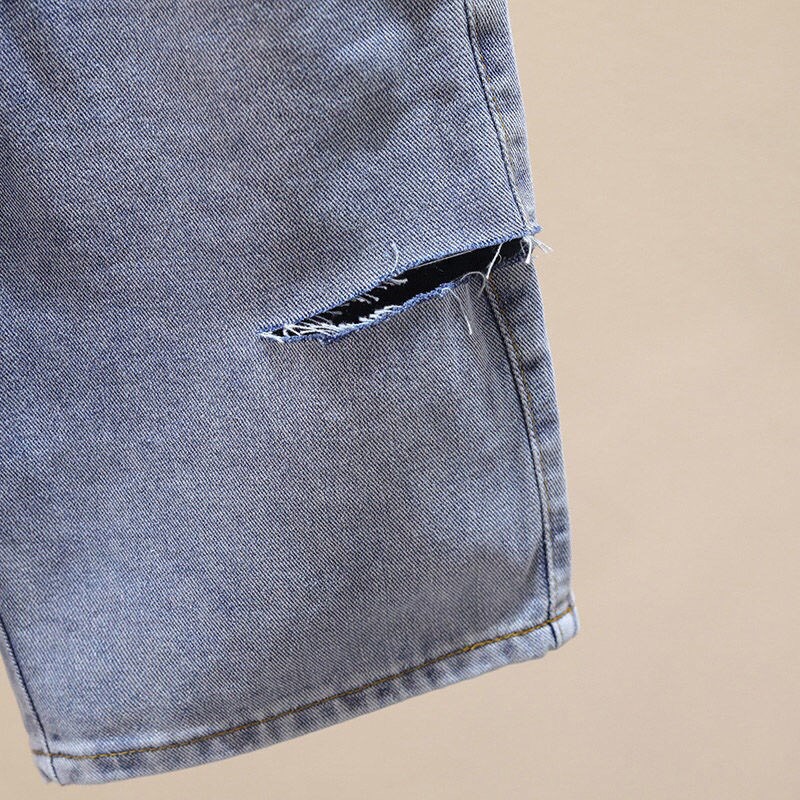 QUẦN JEANS NGỐ LAI CUỐN RÁCH PT