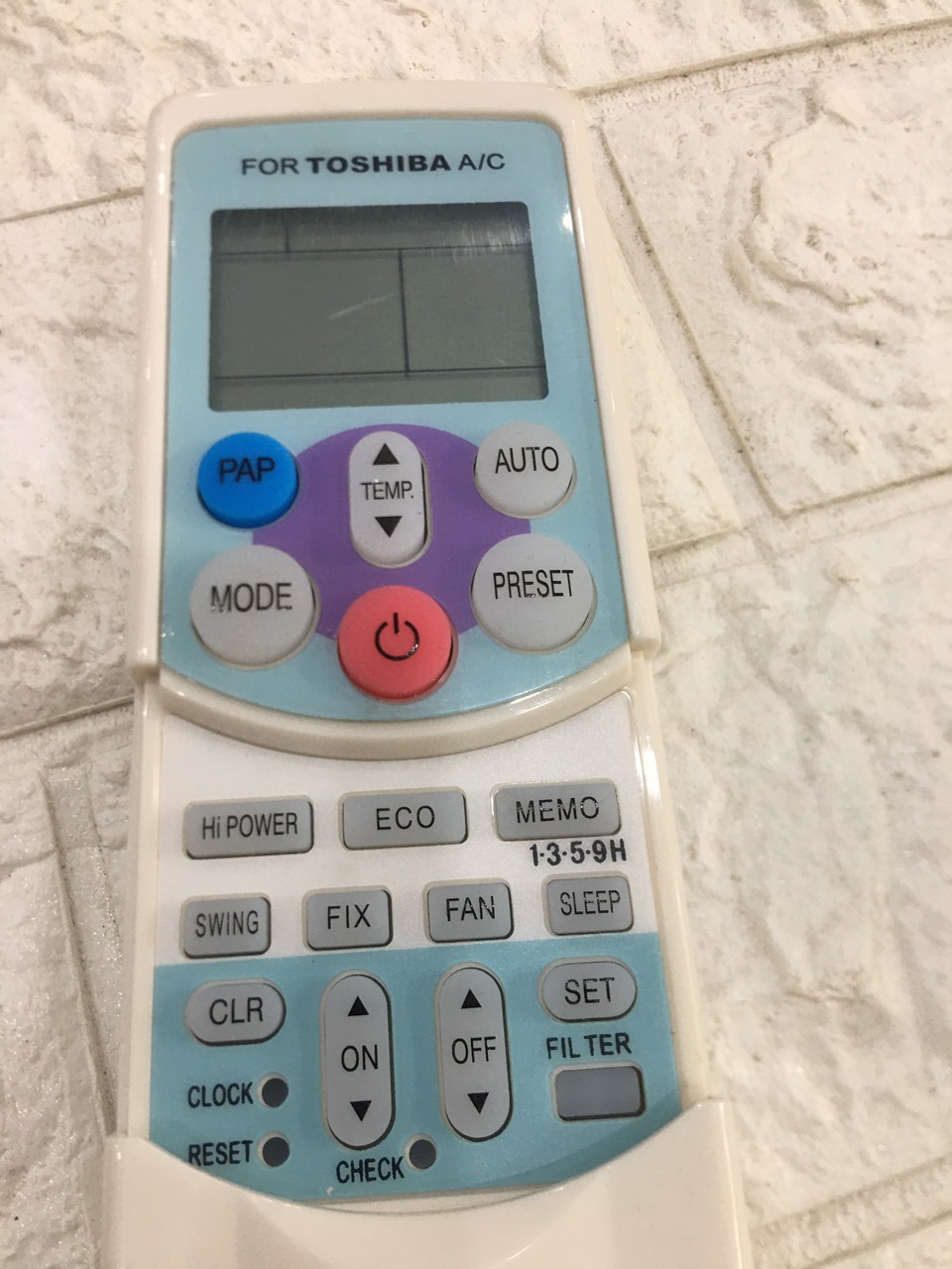 điều khiển điều hòa tosiba nút tím