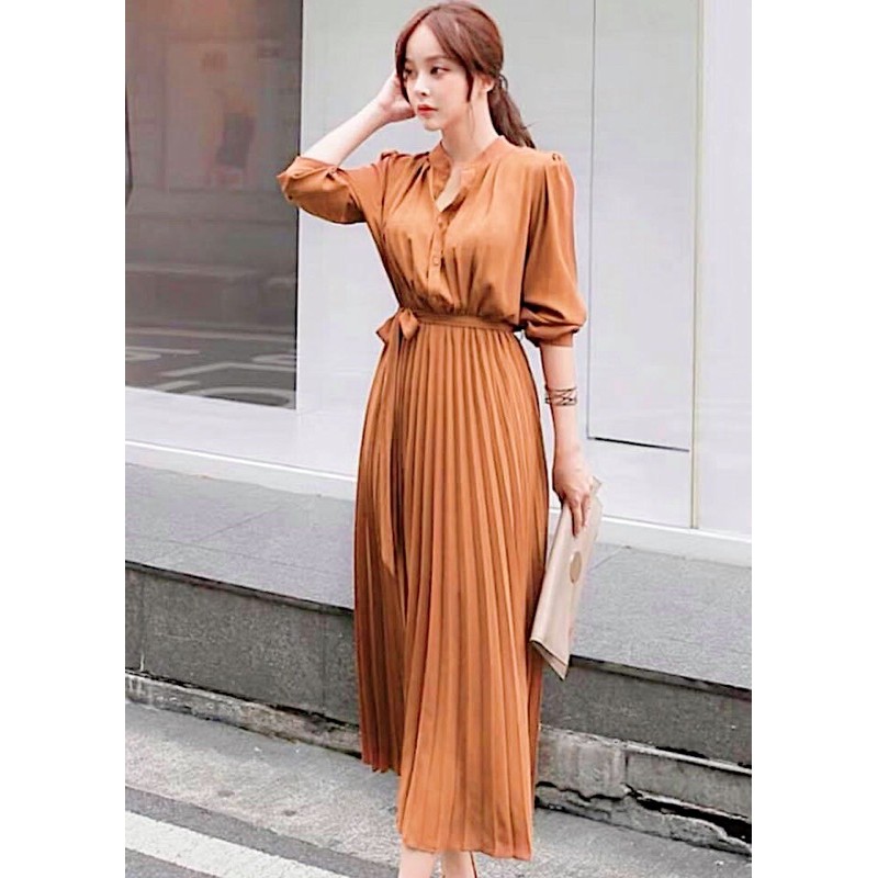 Đầm vàng đồng cổ trụ tùng dập li