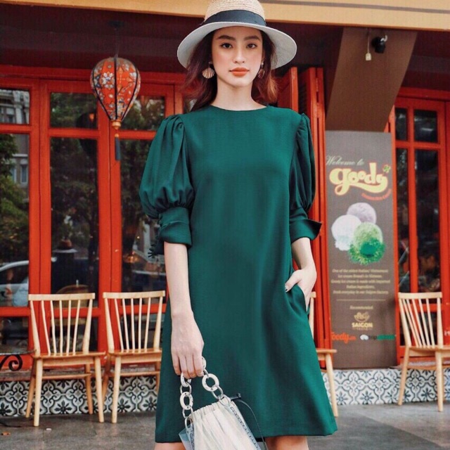 Đầm xanh lính tay nút bọc