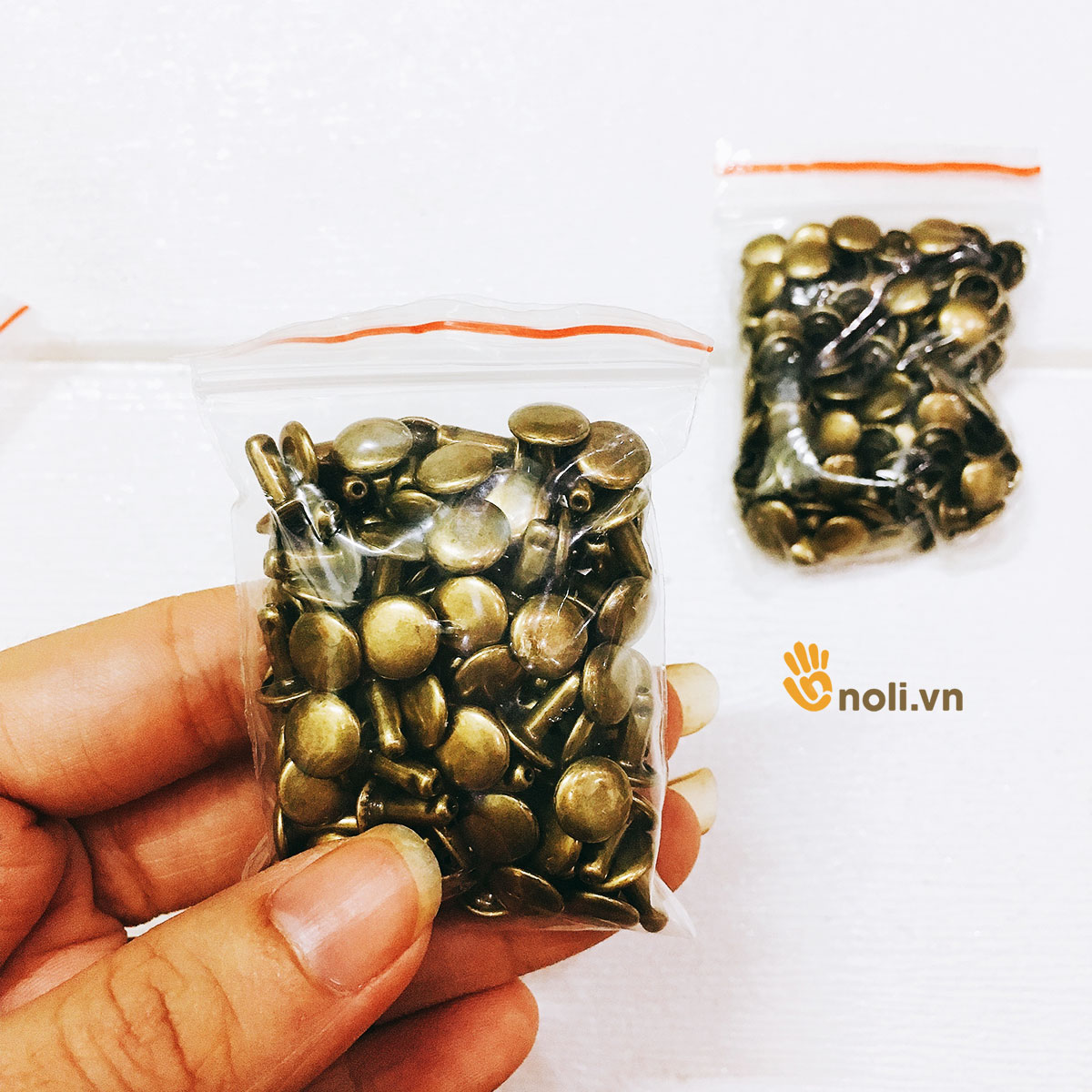 Handbag accessories rivets