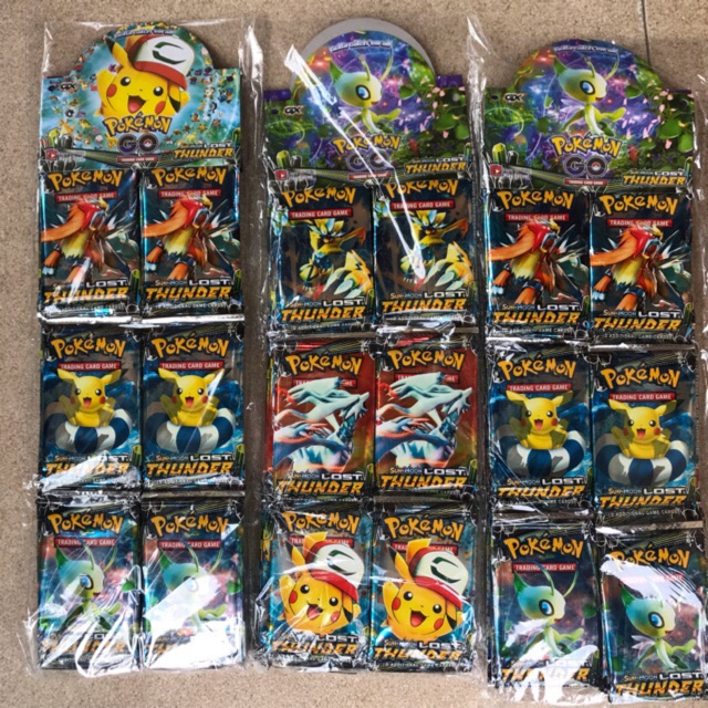 Bán lẻ 1 dây 12 gói thẻ bài pokemon