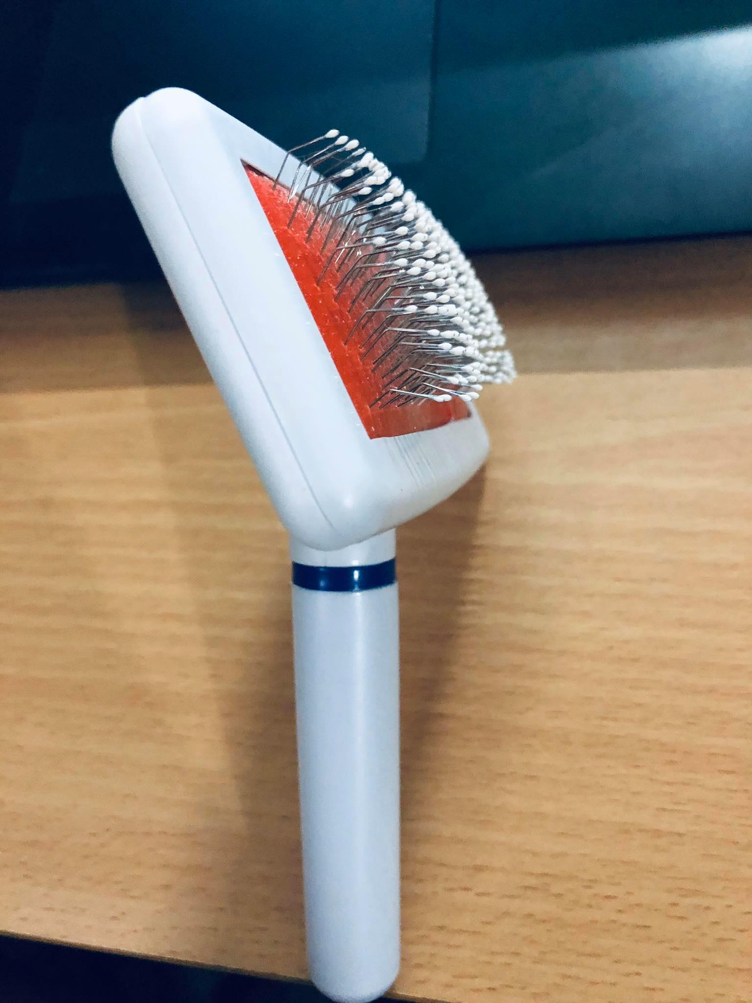 Lược chải lông rụng cho chó mèo