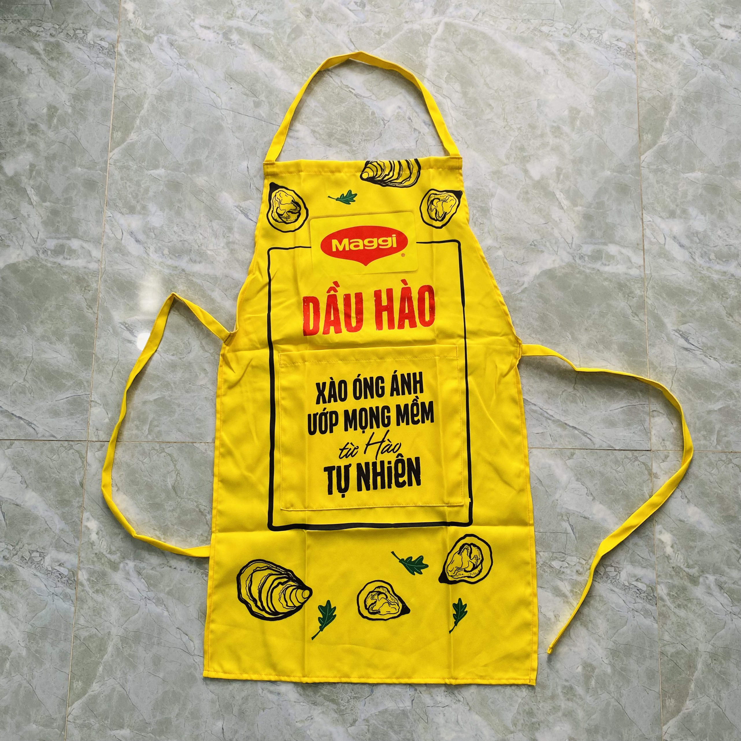 Tạp dề vải Maggi có túi tiện dụng