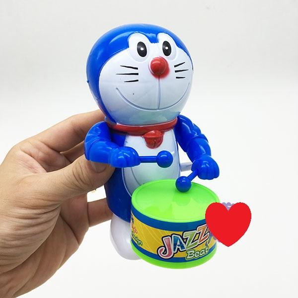 Đồ chơi Doraemon đánh trống vặn cót bằng nhựa