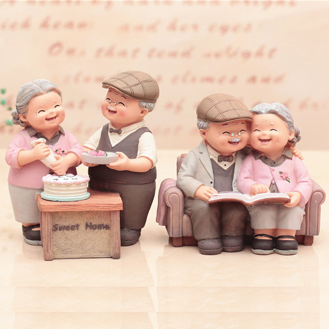 Tượng ông bà đọc sách