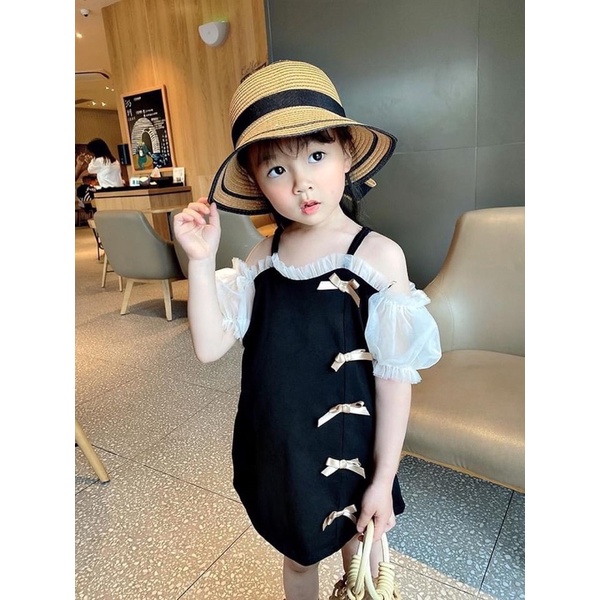 Váy Đen Trễ Vai Đính Nơ Cho Bé Gái