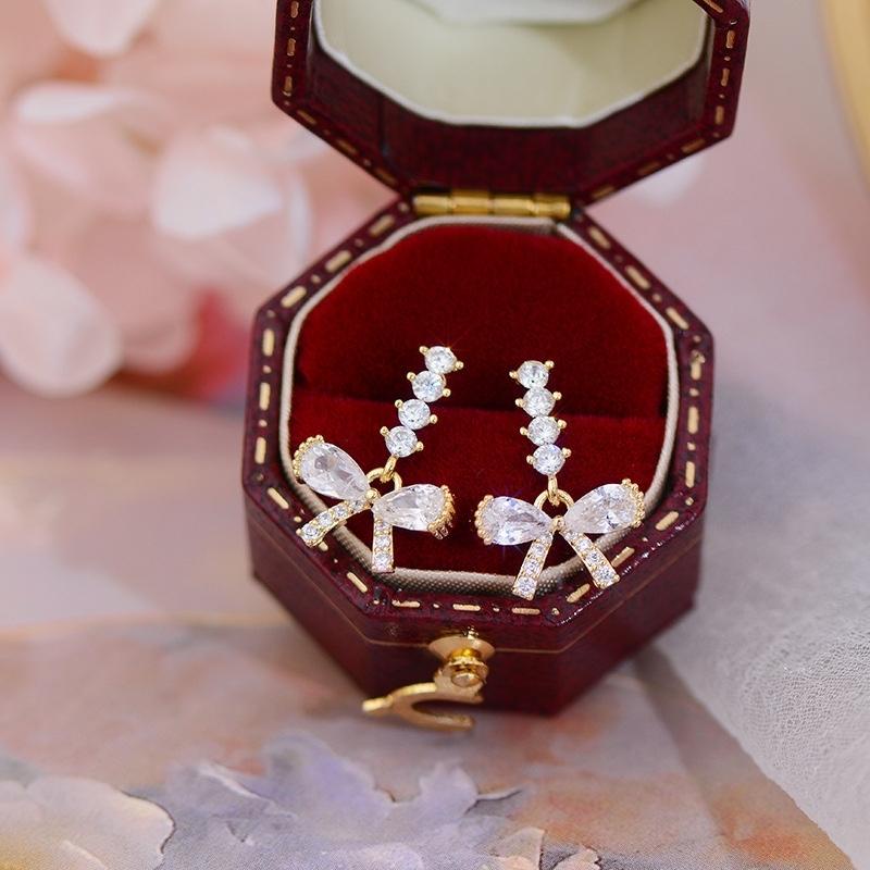 BÔNG TAI NƠ HẠT PHA LÊ - MELY 731