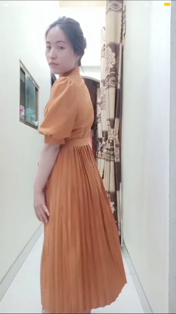 Đầm vàng đồng cổ trụ tùng dập li