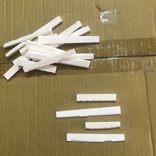 Bộ ngựa lược đàn guitar bằng xương
