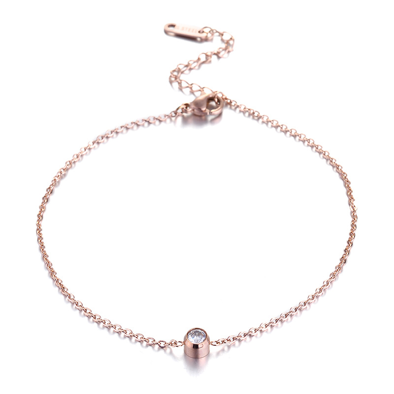 Lắc chân titan không đen không rỉ 1 hạt zircon vàng hồng