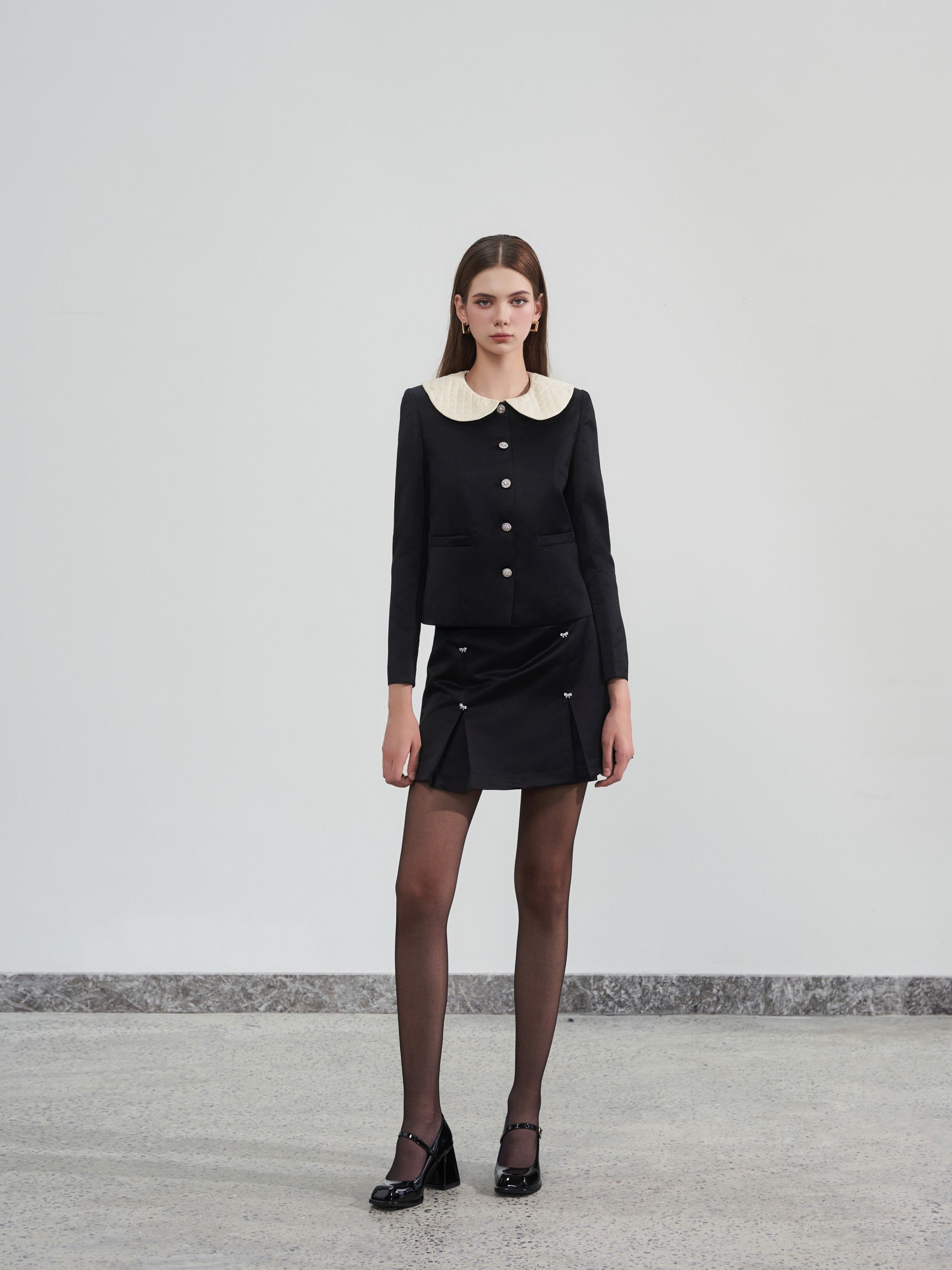 D.CHIC Chân váy A ngắn 4 cúc nơ MS: 381727