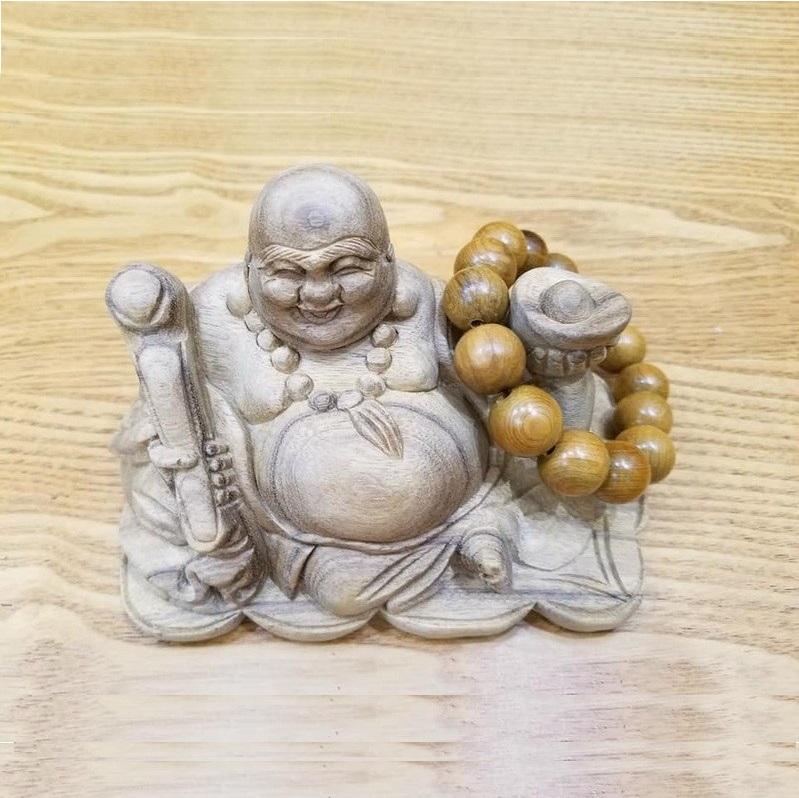 Tượng phật di lặc để ô tô gỗ xá xị