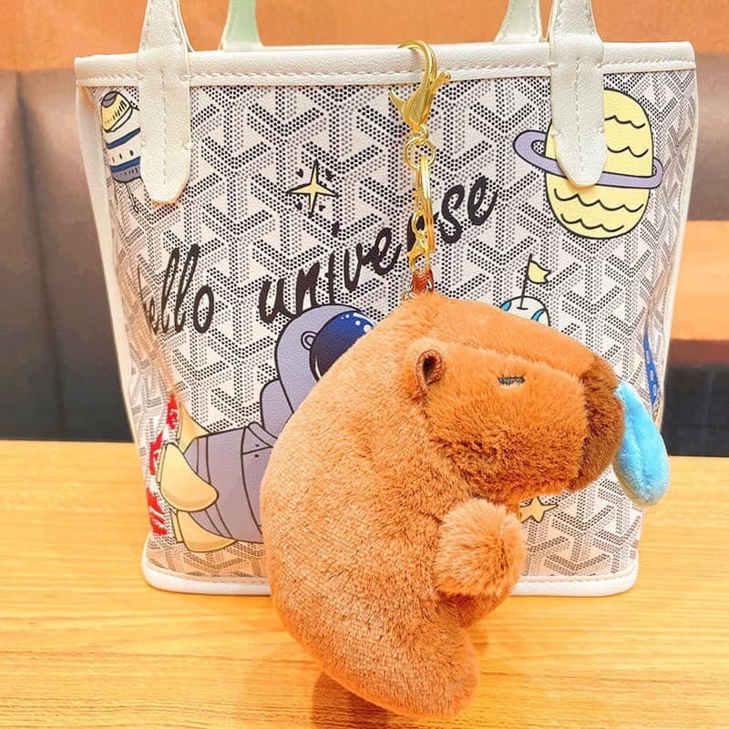 Móc khóa capybara chảy mũi rút mũi hot trend