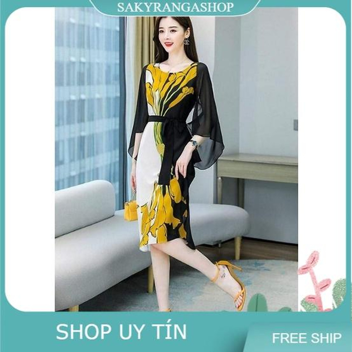 Đầm suông hoa rum vàng thắt nơ eo