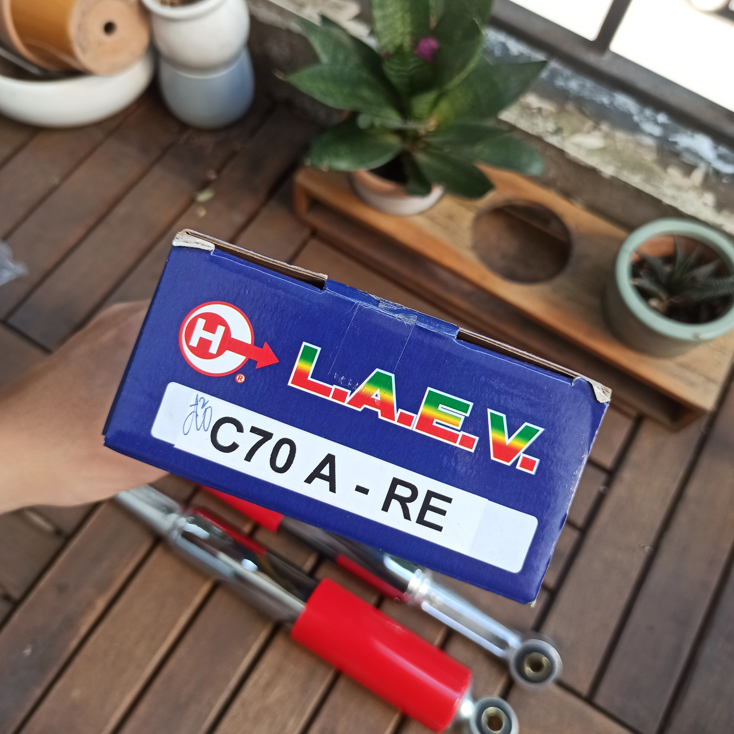 Bộ phuộc sau ( giảm xóc) cub 81. 82. DD. DH màu đỏ