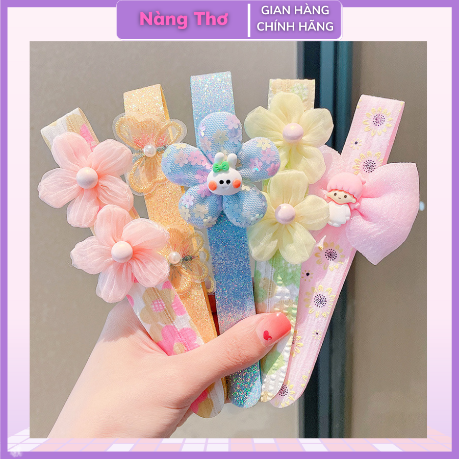 Bờm cài tóc dán dính hoa và nơ cho bé siêu đáng yêu