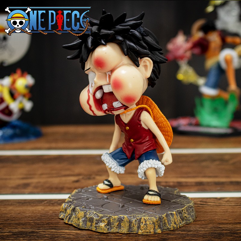 mô hình luffy bị đánh sưng mặt