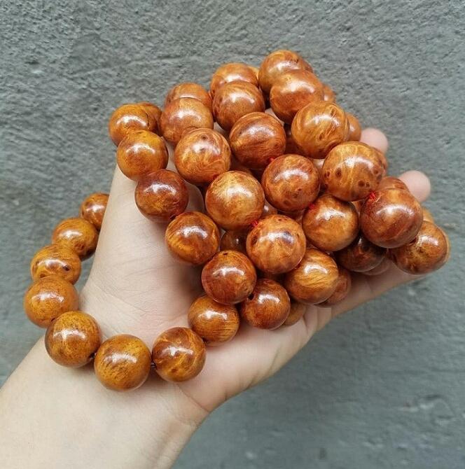 VÒNG TAY GỖ NU HUYẾT LONG 18LY